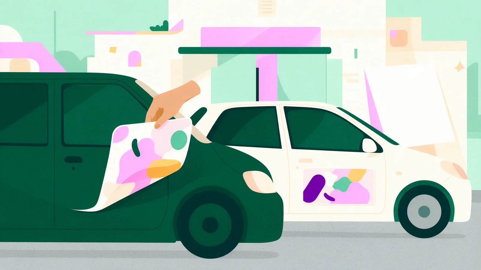 A hand lifting a flexible magnet sign off a car door next to a vinyl decal on another car